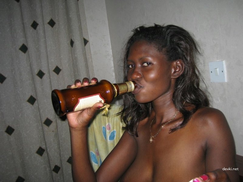 Wet Ebony Amateur in Home Setting: Explicit Black Woman Photo