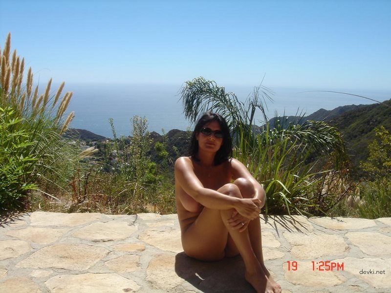 Naked Woman Sunbathing: Explicit Amateur Vacation Photo