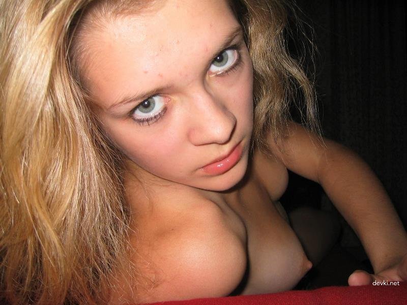 Satisfied Blonde Shows Off Small Tits in Amateur Photo - Explicit and Bold Display of Petite Breasts