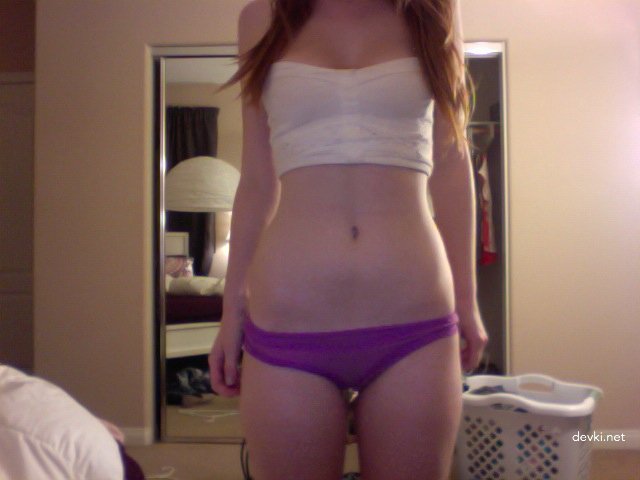 Fiery Slutty Redhead Amateur Girl in Explicit Porn Photos