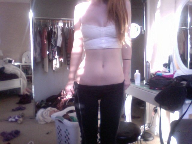 Fiery Slutty Redhead Amateur Girl in Explicit Porn Photos