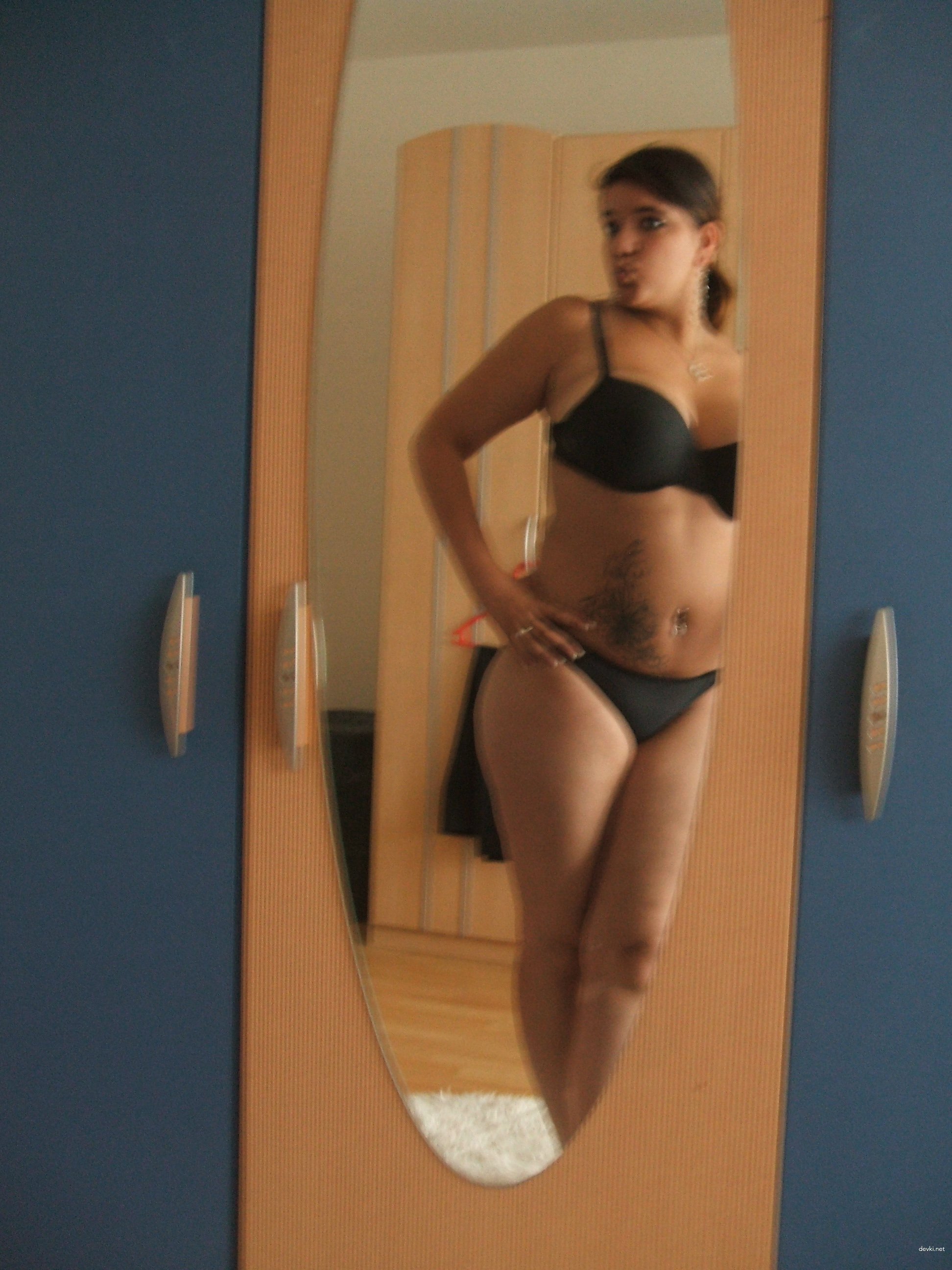 Naughty Girl Masturbates Pussy: Explicit Amateur Porn Photo