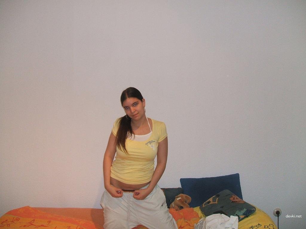 Naughty Girl Masturbates Pussy: Explicit Amateur Porn Photo