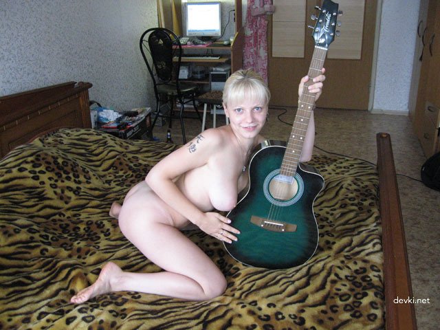 Rural Girl Poses Naked on Bed: Explicit Amateur Photo Shoot