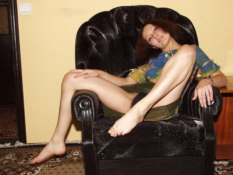 Explicit Amateur Photo: Girl Strips in Chair for Sensual Photoshoot