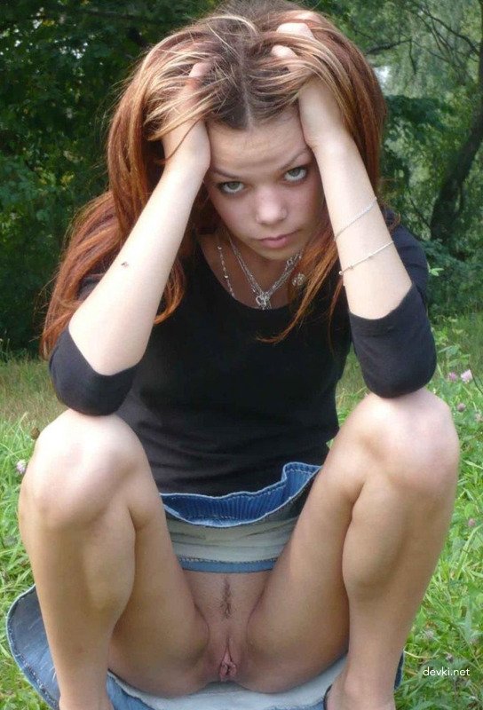 Young girl flaunts pussy in amateur porn pic.