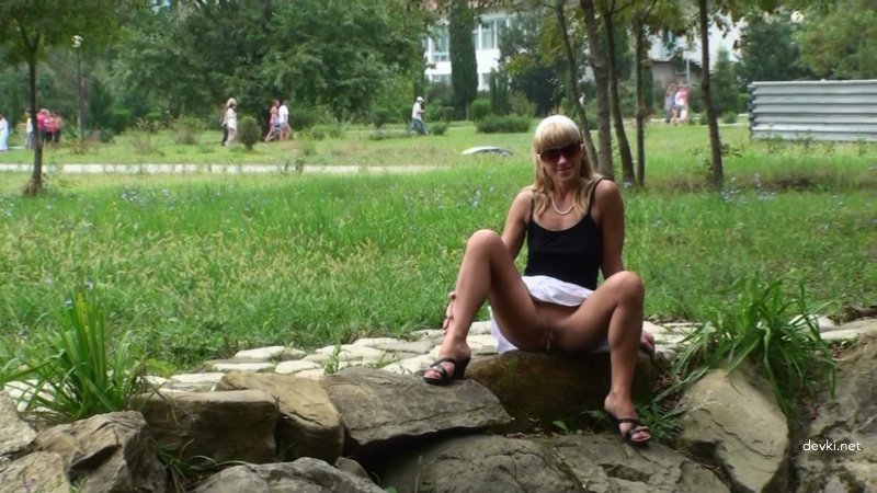 Public Pissing: Woman Peeing on Road - Amateur Porn Pic