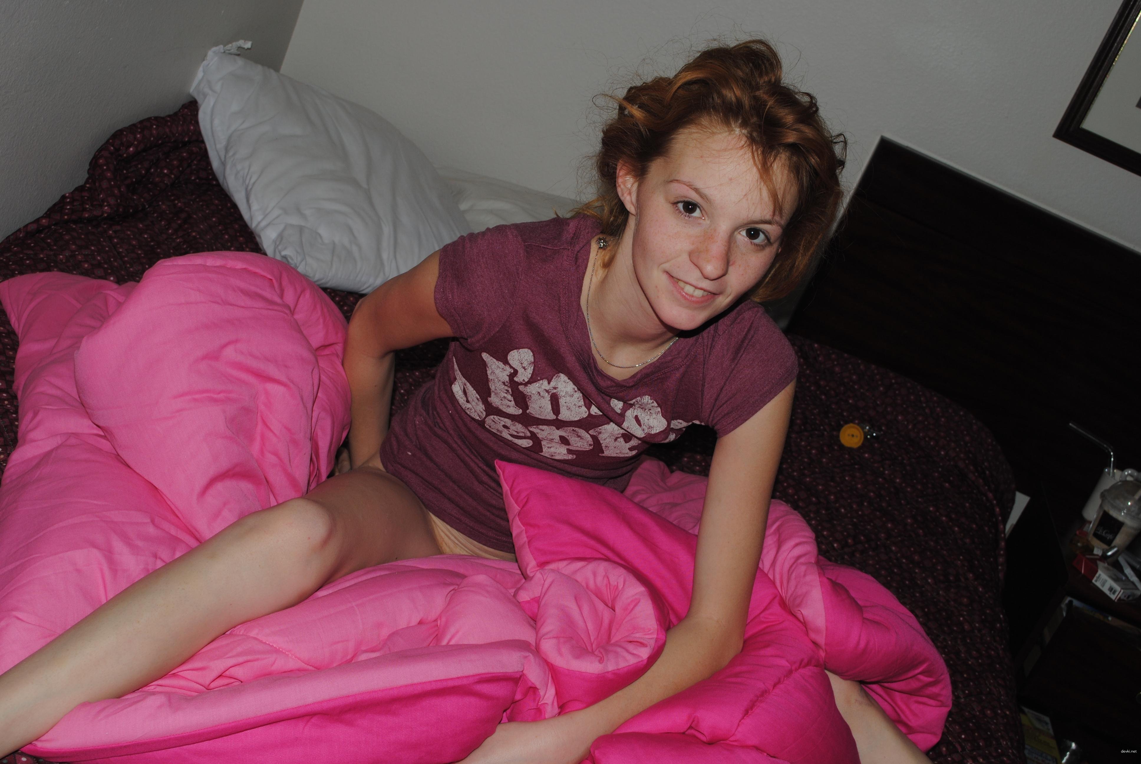 Amateur redhead girl shows off her explicit pussy - Uncensored close-up photo