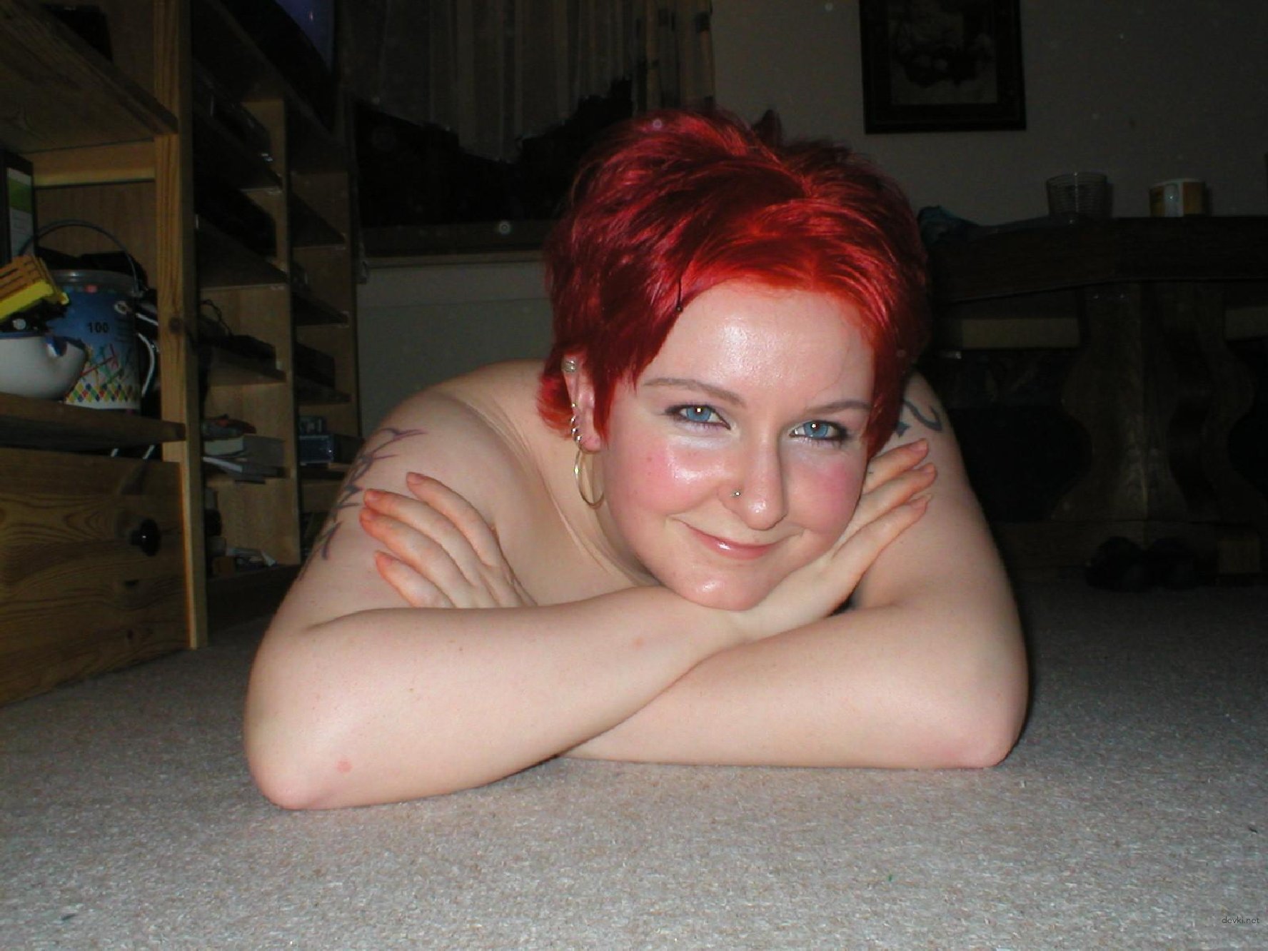 Redhead Amateur Girl Poses Naked in Explicit Porn Photos