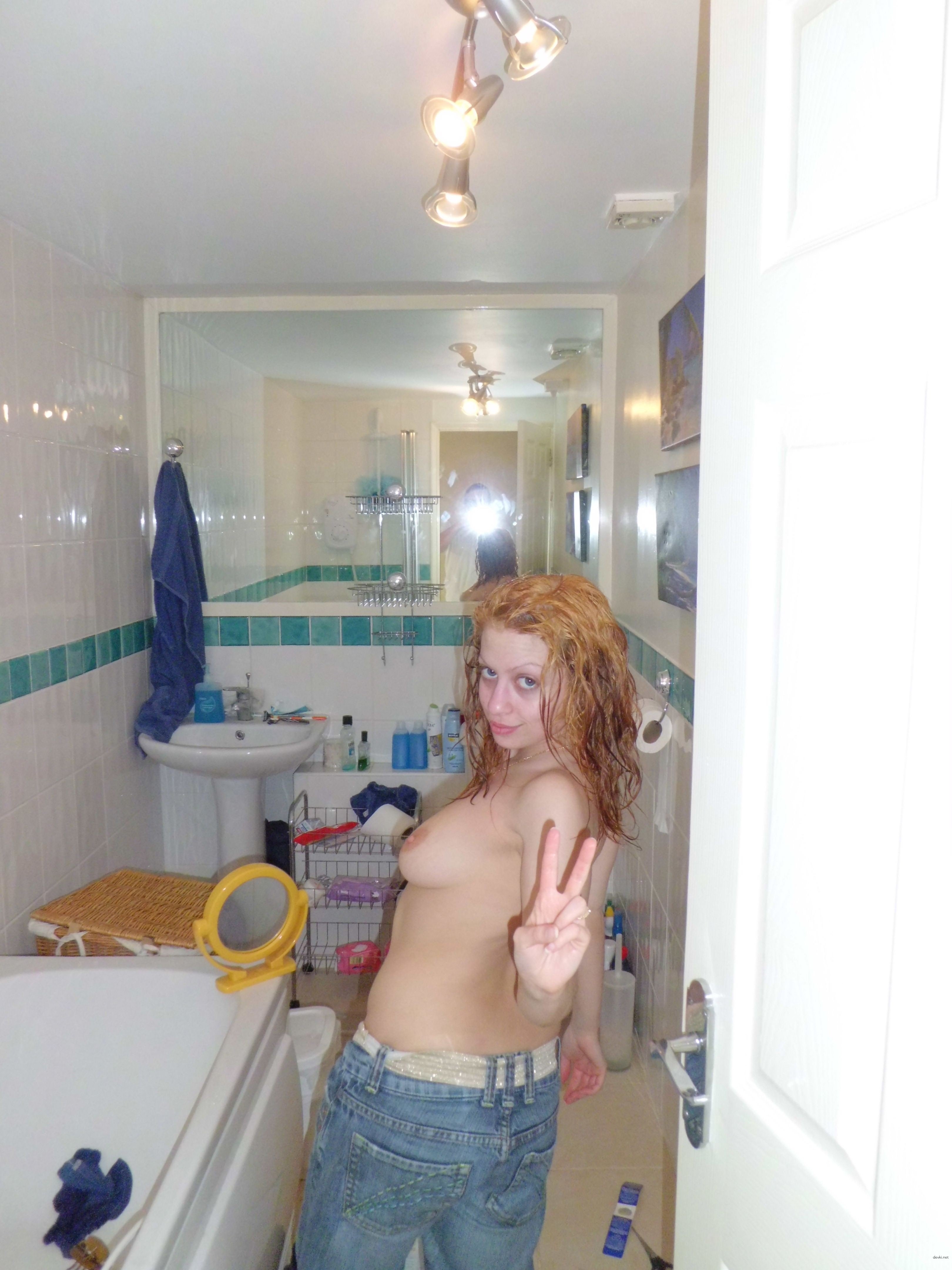 Amateur Girl Takes Explicit Photos with Various Hairstyles for XXX Fun