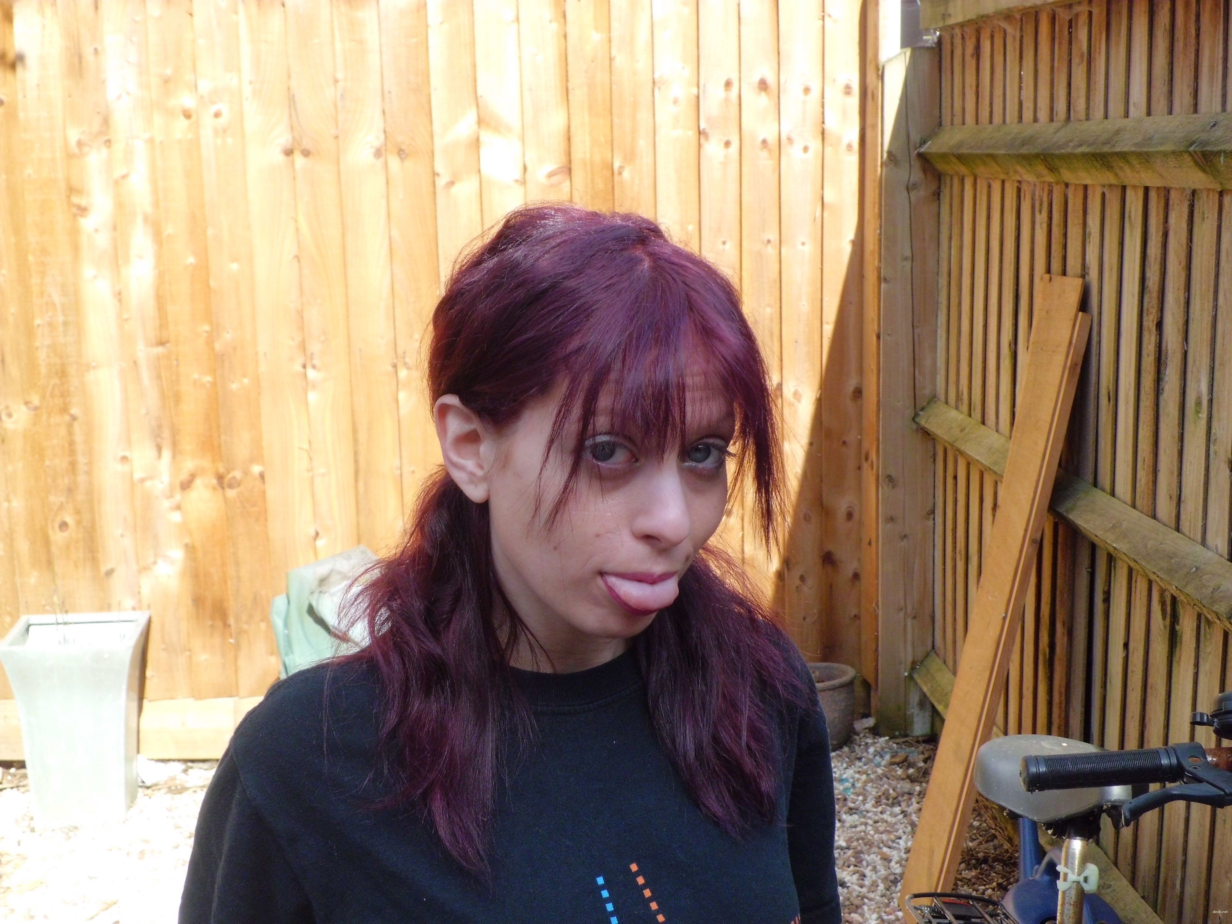 Amateur Girl Takes Explicit Photos with Various Hairstyles for XXX Fun