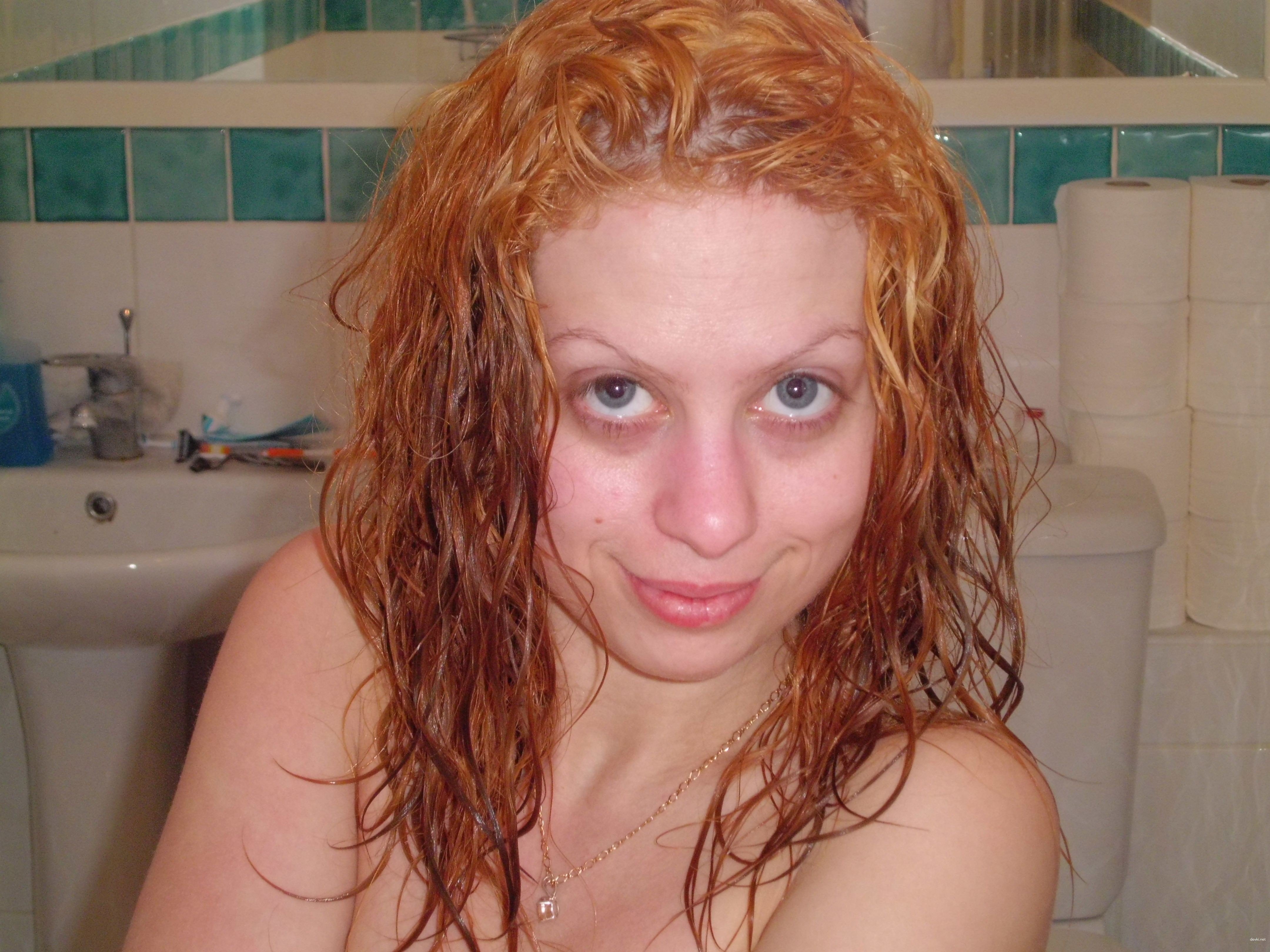 Amateur Girl Takes Explicit Photos with Various Hairstyles for XXX Fun