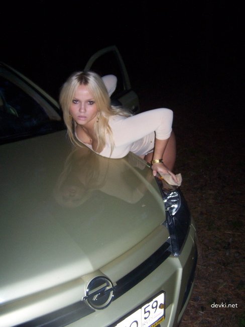 Drunk girl partying by car: explicit amateur photo