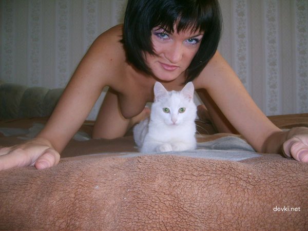 Amateur Brunette and Her Pink Pussy: Explicit Close-Up Photo