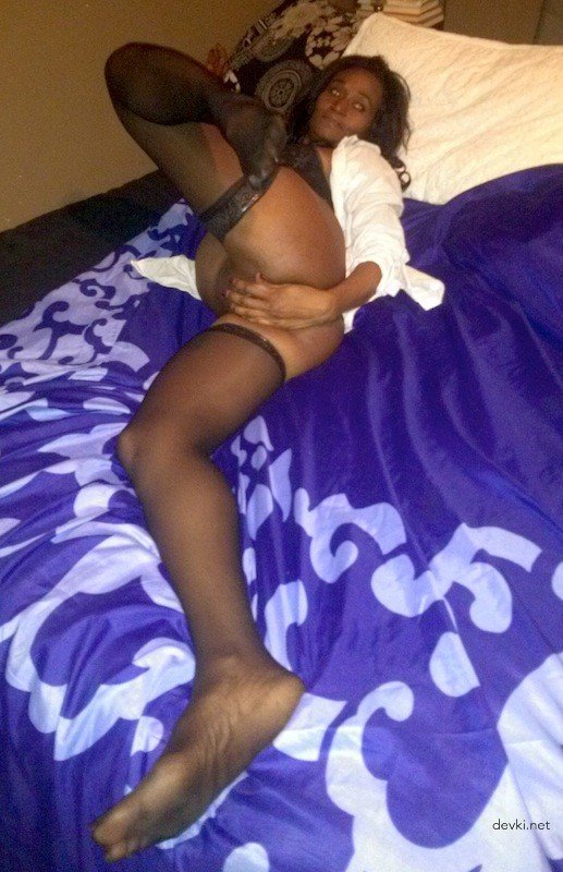 African Woman in Stockings with Wet Pussy: Explicit Amateur Photo