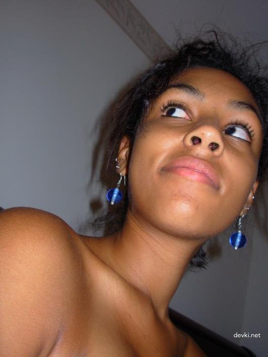 Young Girl with Big Tits: Explicit Amateur Photo