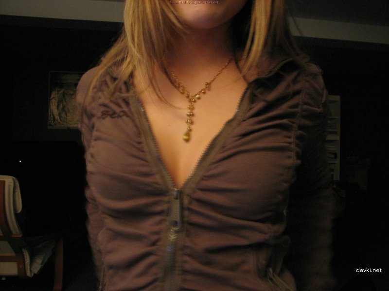 Young Amateur Exposes Tits: Explicit Photo Displaying Boobs