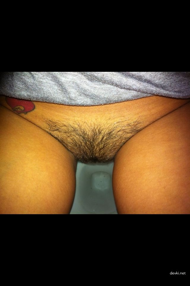 Excited Brunette with Hairy Pussy in Amateur Porn Photo