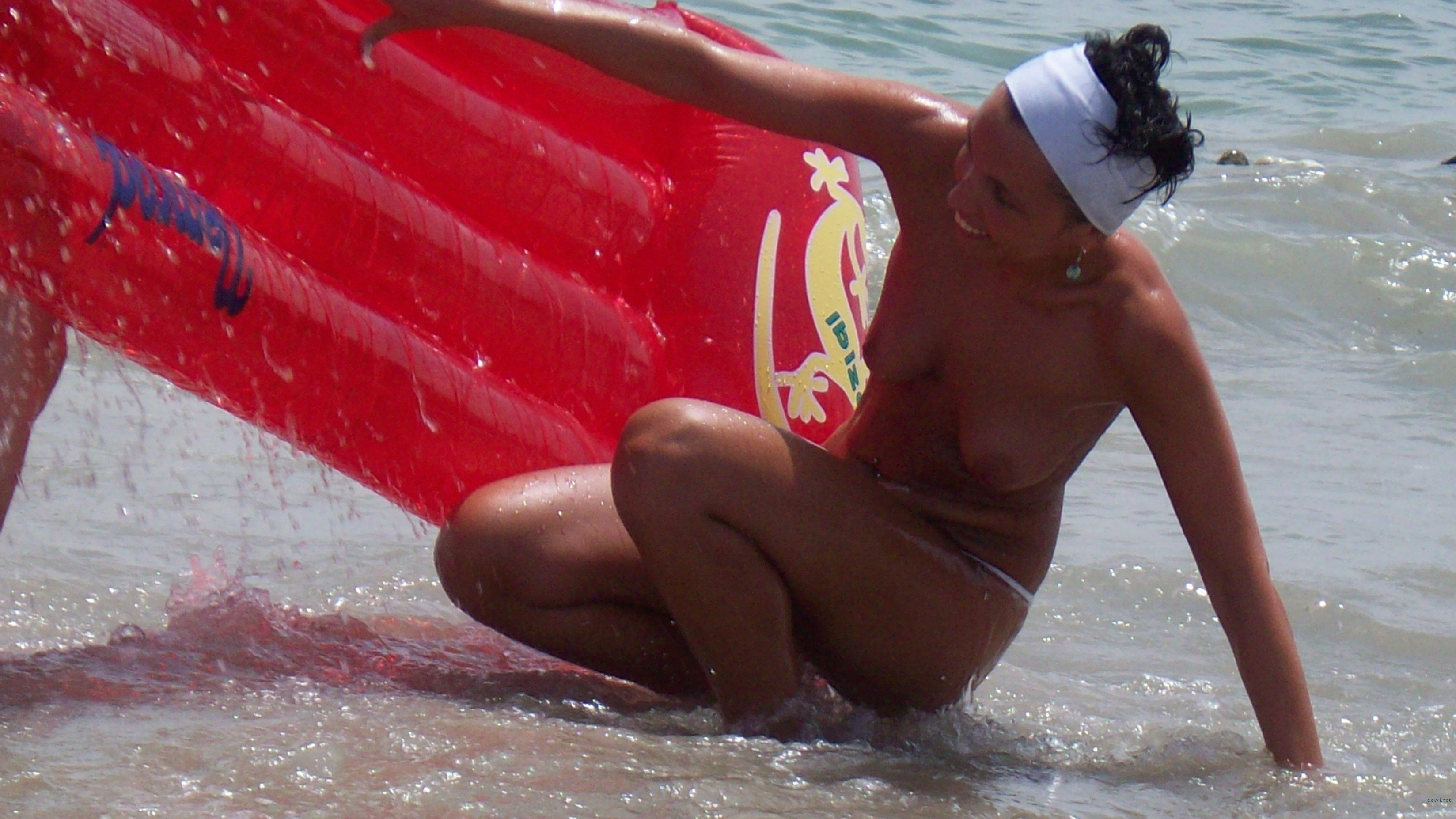 Topless Woman at Beach: Explicit Amateur Photo of Naked Lady