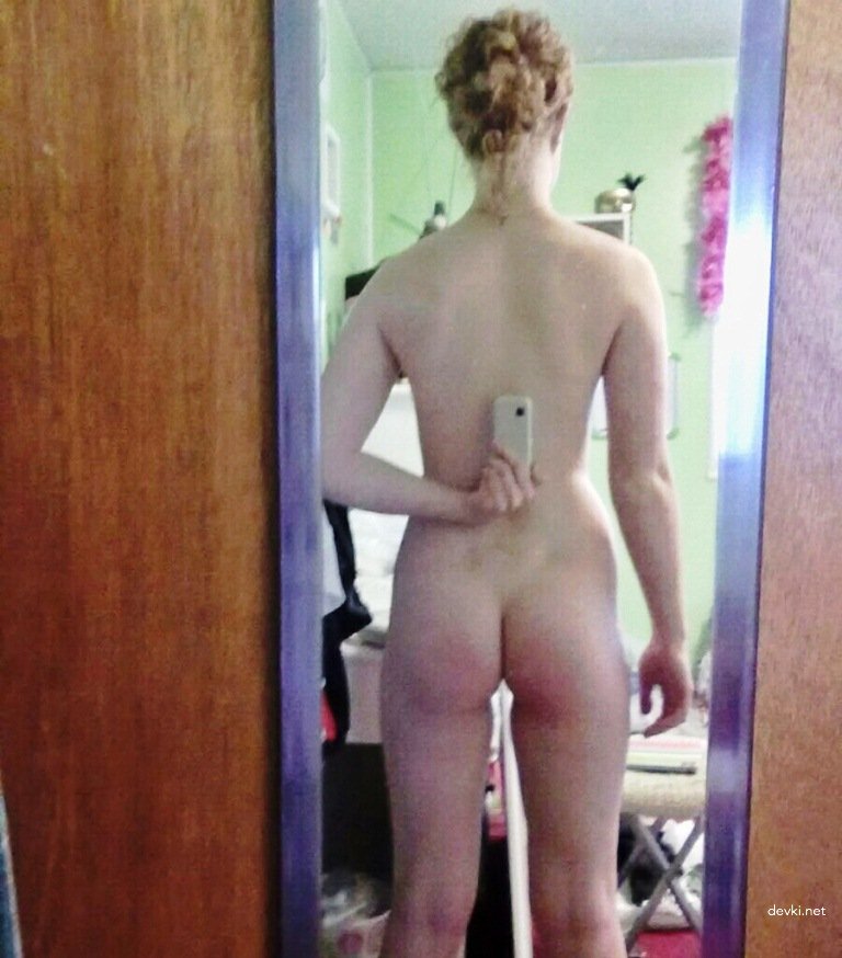 Raunchy redhead amateur snaps nude selfies