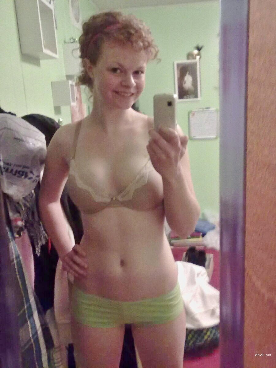 Raunchy redhead amateur snaps nude selfies