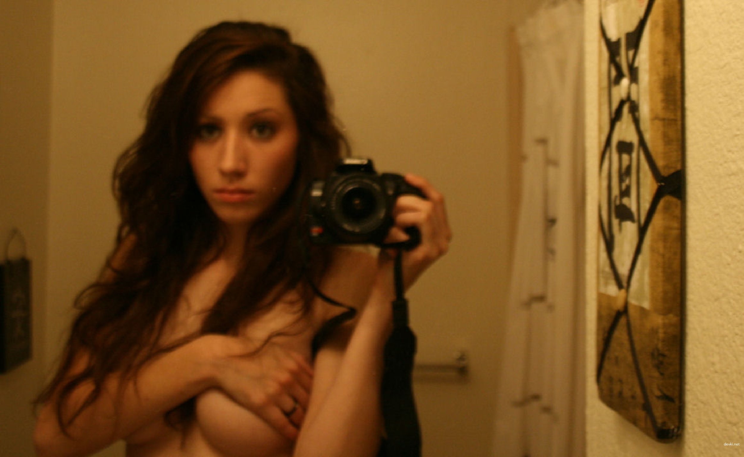 Explicit Amateur Photo of Young Beauty: Seductive Poses and Sultry Looks