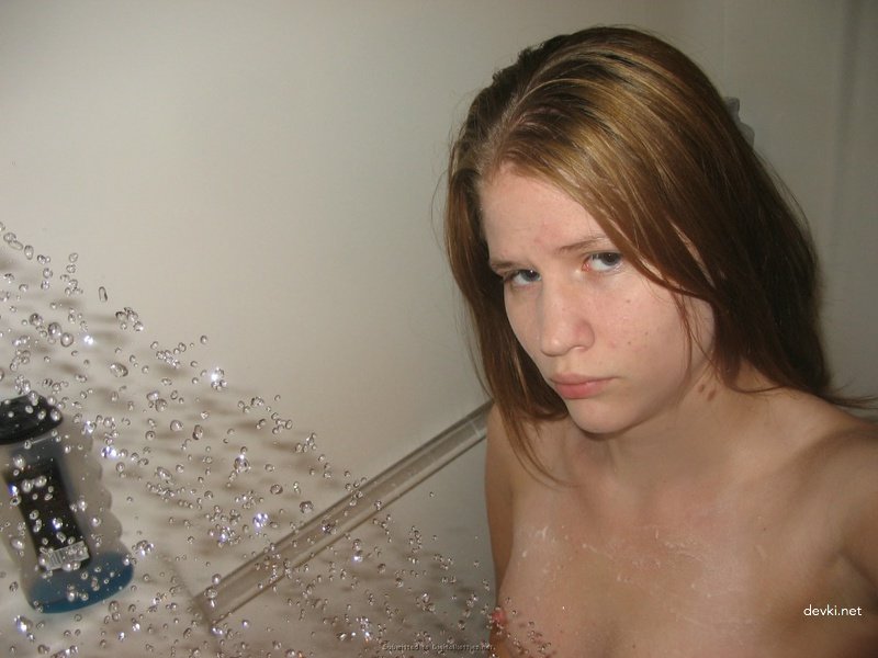 Busty Amateur Exposes Her Tight Pussy for the Camera