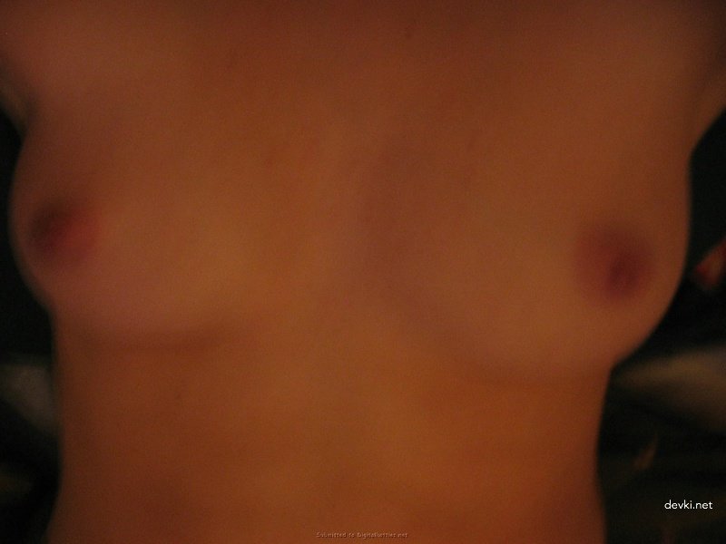 Busty Amateur Exposes Her Tight Pussy for the Camera