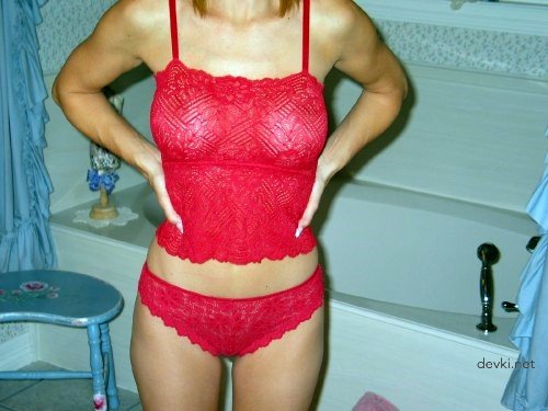 Sexy Woman with Silicone Breasts Poses Nude - Explicit Amateur Photo