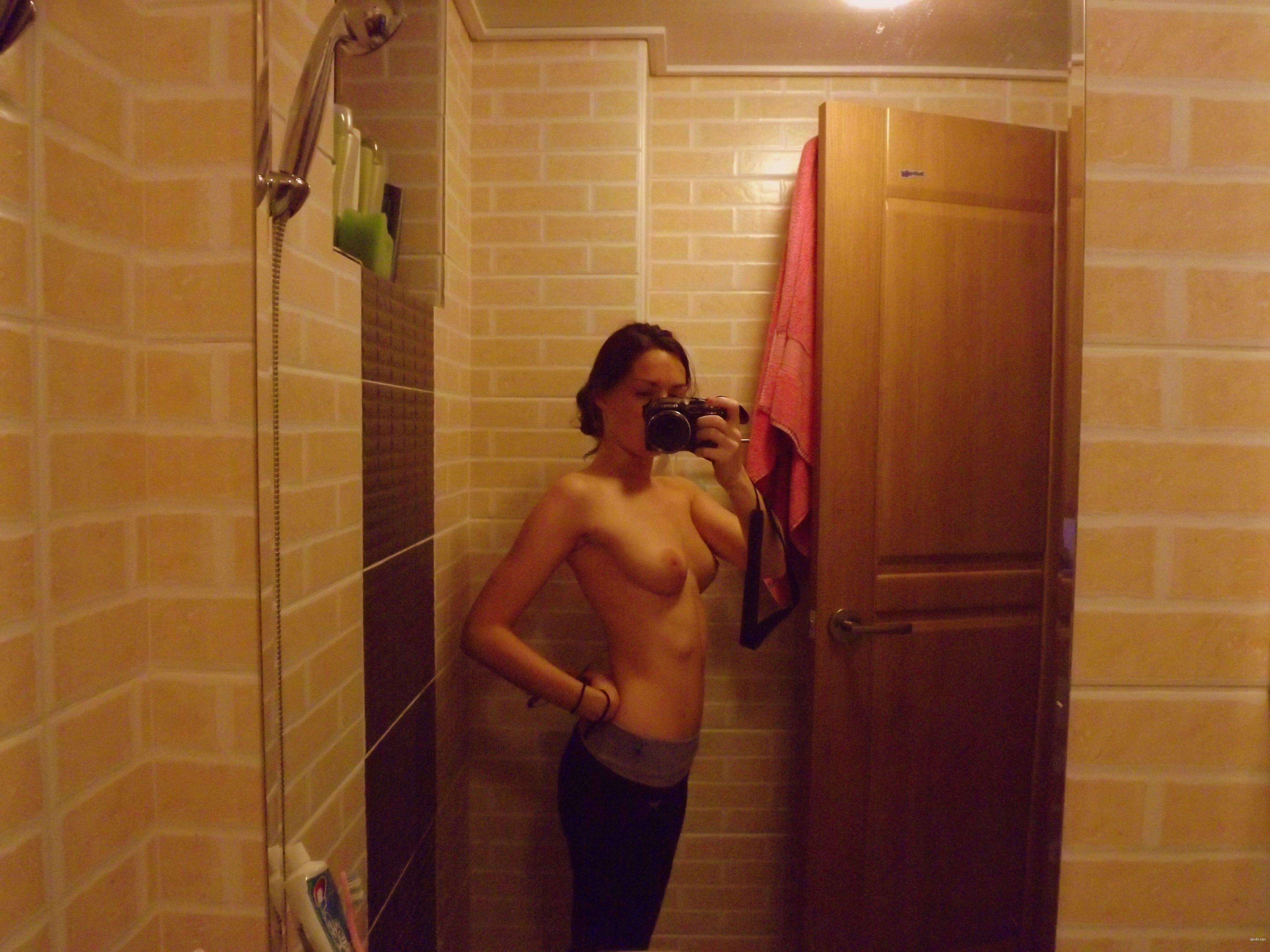 Selfie in Mirror: Amateur Photo with Explicit Nudity and Sensual Poses