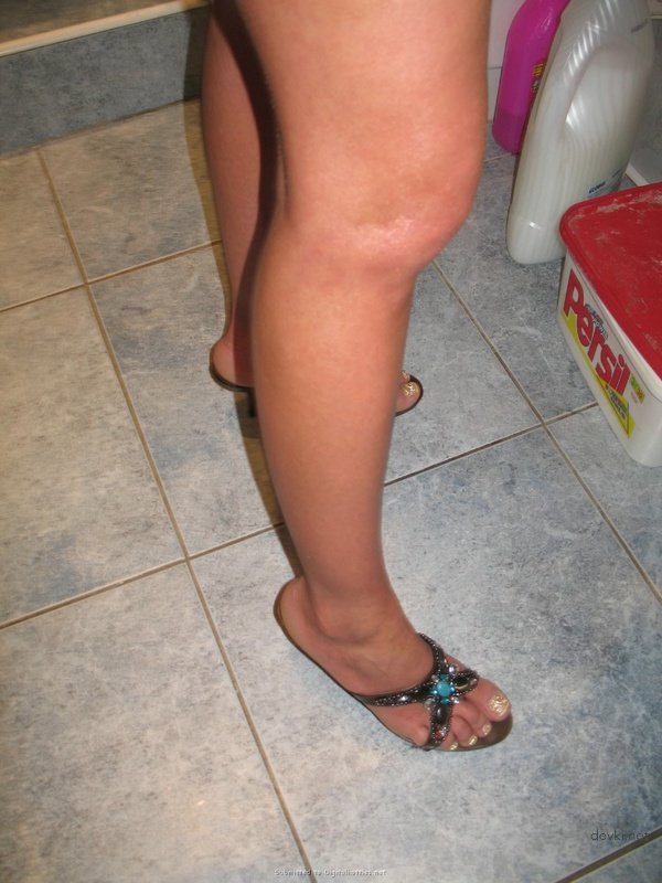 Girl Strips and Gives Blowjob in Amateur Porn Photo