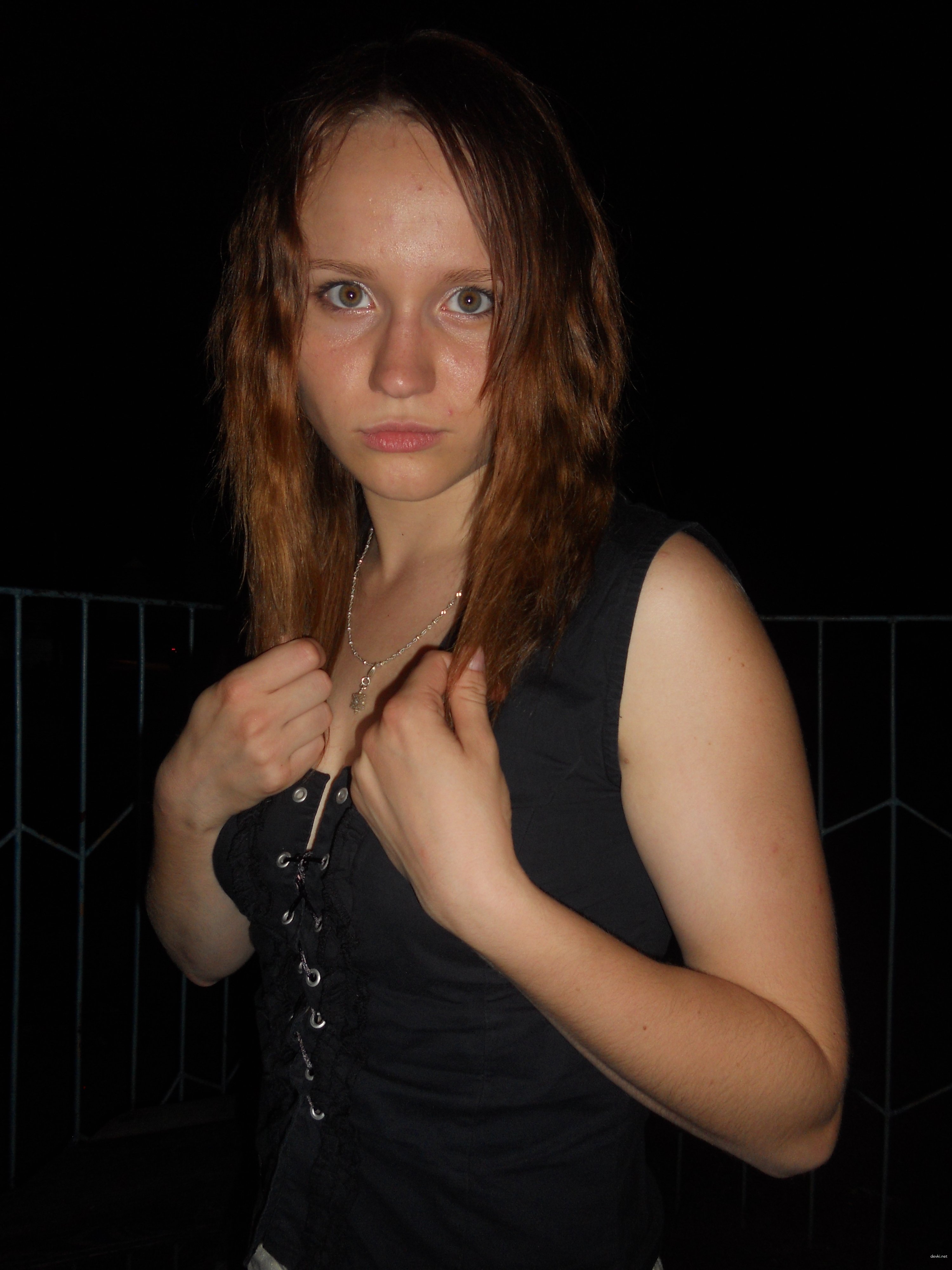 Young beauty flaunts firm tits in amateur porn pic