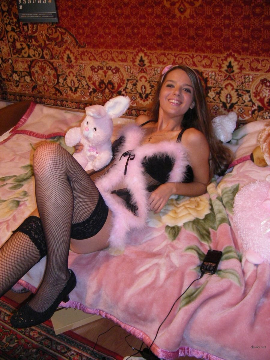 Seductive Young Woman Posing at Home in Lingerie - Amateur Explicit Photo