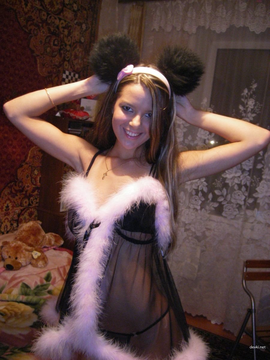 Seductive Young Woman Posing at Home in Lingerie - Amateur Explicit Photo