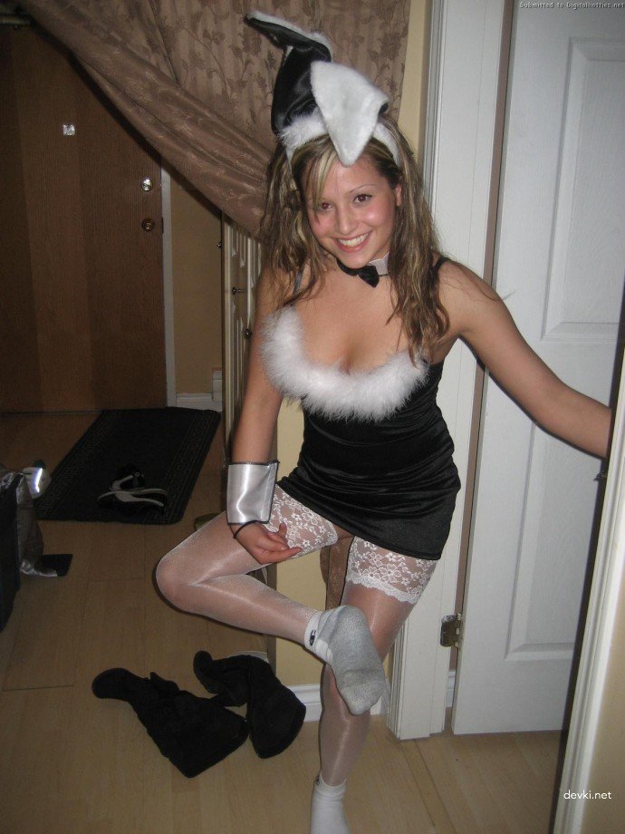 Young girl sucks cock in amateur porn photo.