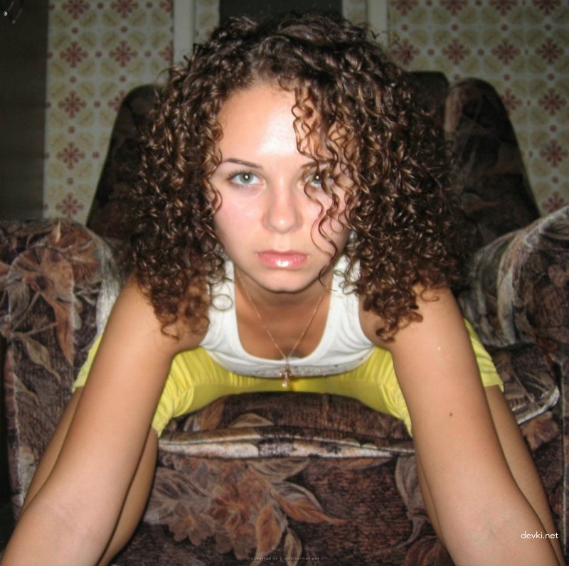 Curly beauty shows pussy: Explicit amateur photo