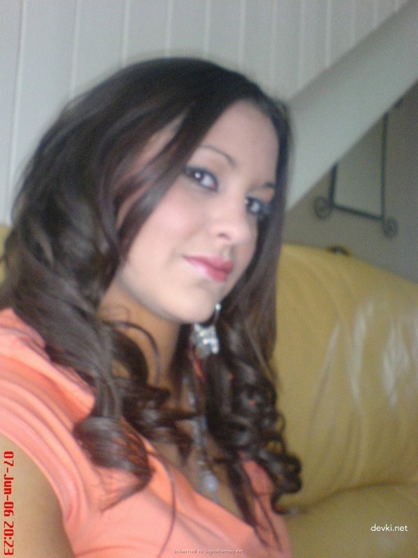 Sultry Brunette Poses Seductively After Wild Night Out - Amateur Clubbing Photo
