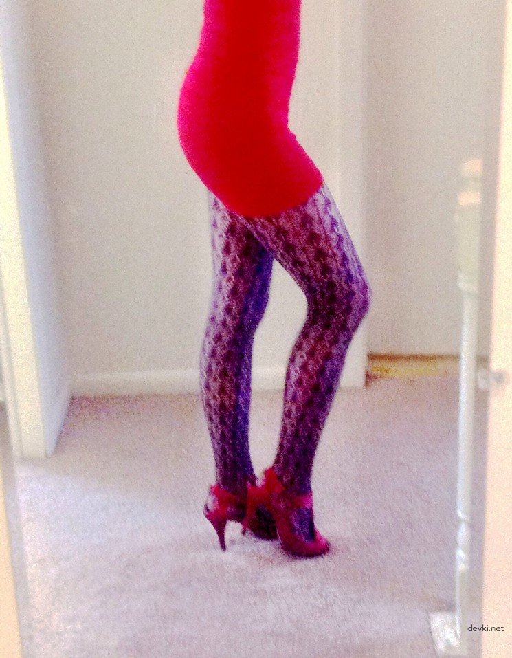 Fiery Redhead Trying on Red Dress in Amateur Porn Pic