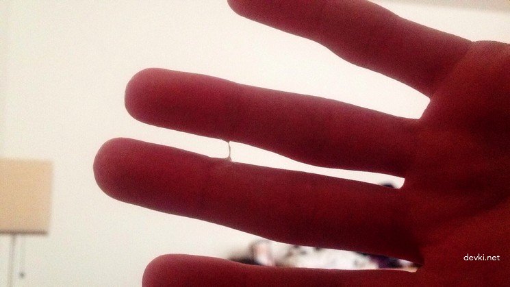 Fiery Redhead Trying on Red Dress in Amateur Porn Pic