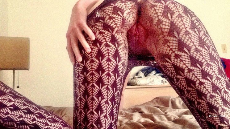 Fiery Redhead Trying on Red Dress in Amateur Porn Pic