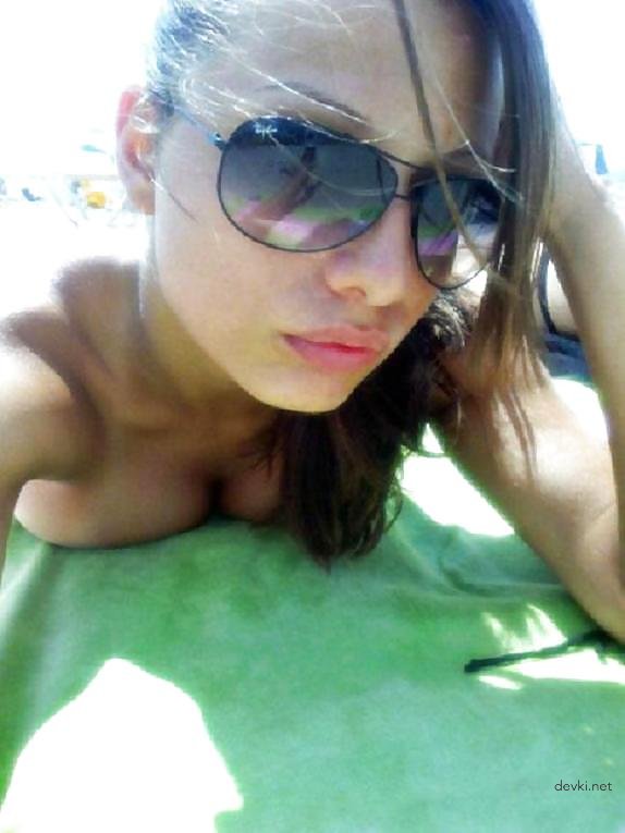 Hot Beach Babe Sunbathing - Amateur Photo of Girl Tanning