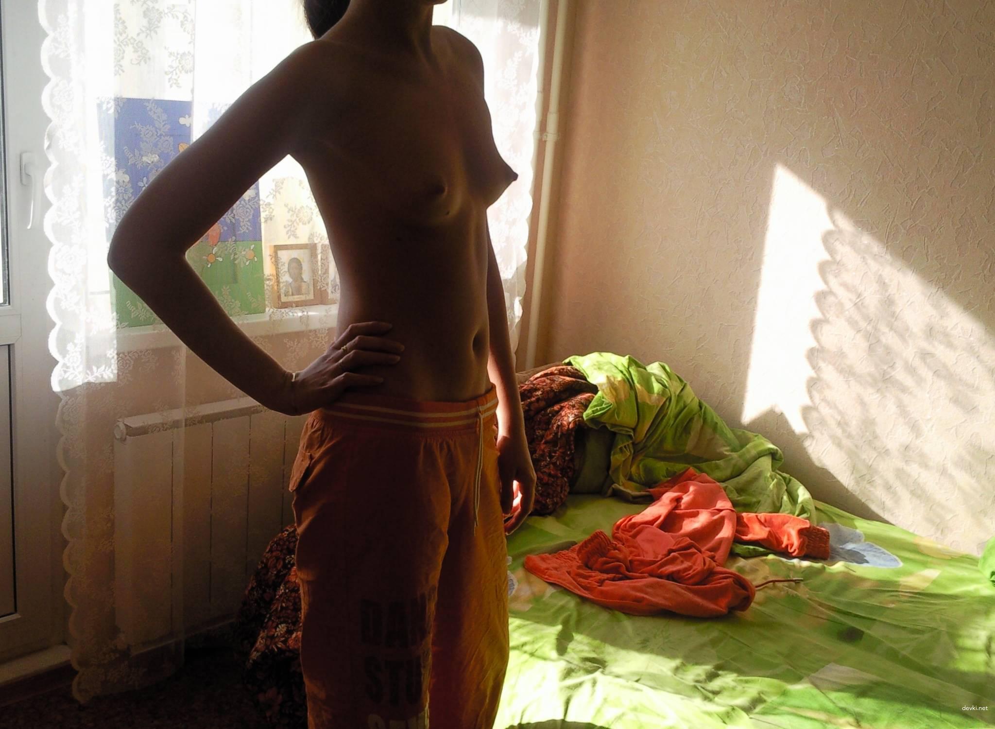 Naughty Girl Strips and Poses at Home - Explicit Amateur Porn Photo