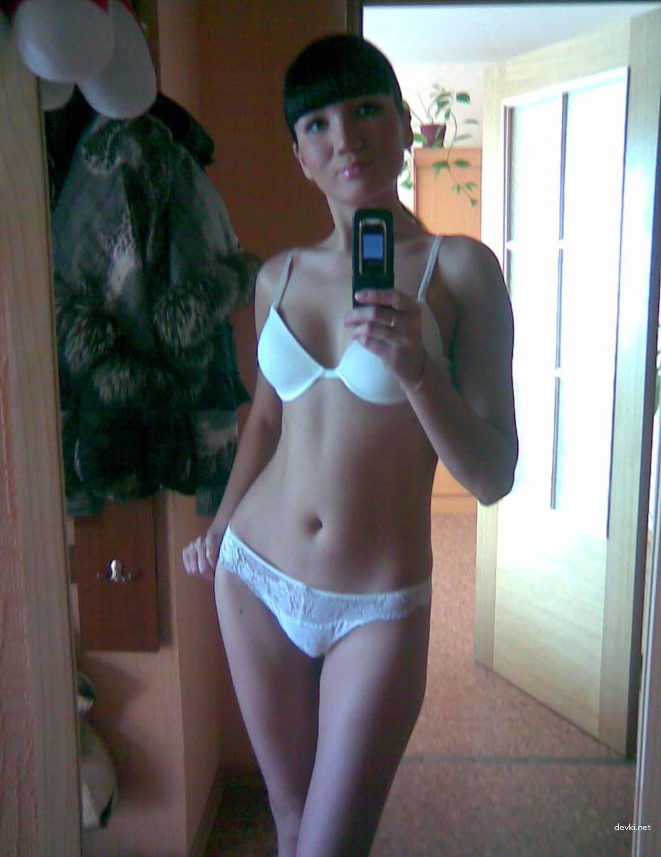 Naughty Girl Strips and Poses at Home - Explicit Amateur Porn Photo