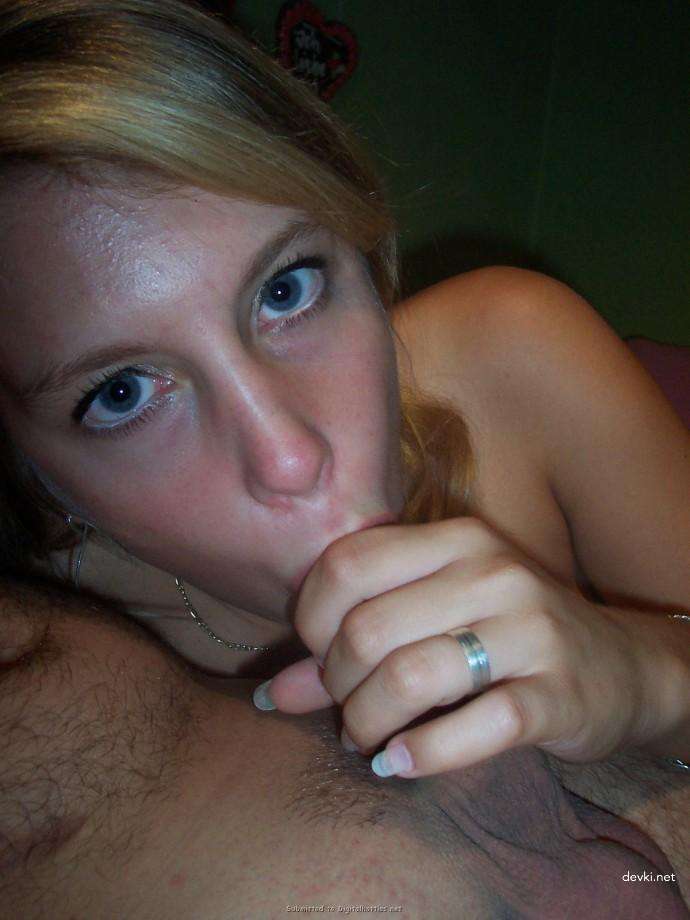 Amateur Girl Bends Over and Deepthroats Cock - Explicit Blowjob Photo
