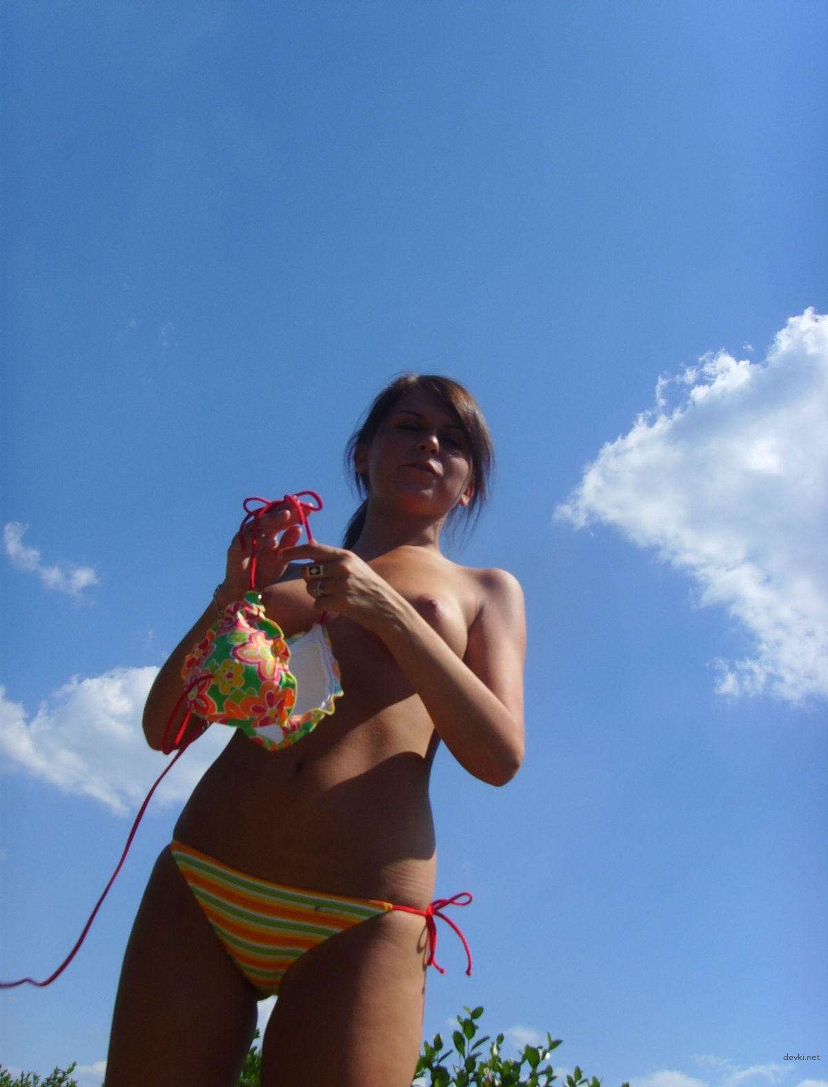 Hot Amateur Girl Strips Naked Outdoors - Explicit Nude Photos