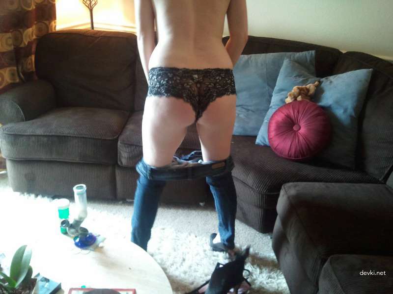 Redhead babe strips panties and has hot sex in amateur porn pics