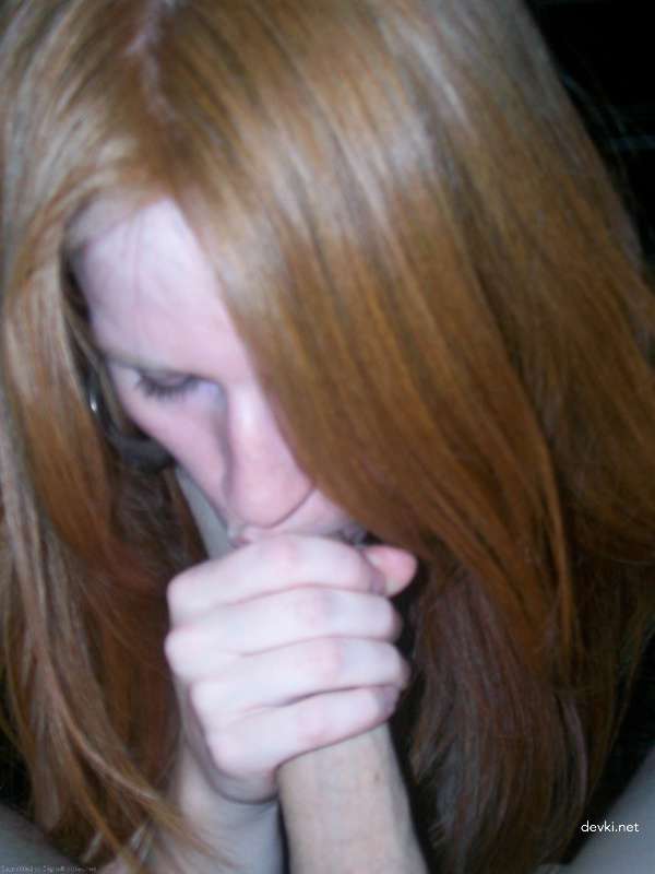 Fiery Redhead Rides Black Dildo in Amateur Porn Pic