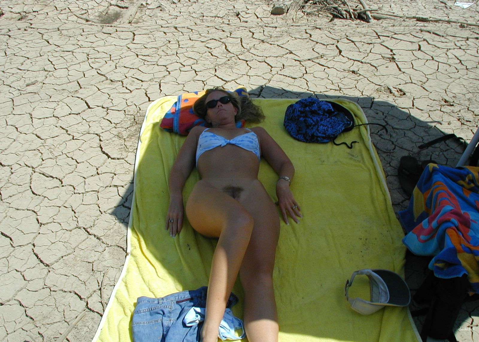 Nude Woman Sunbathing on Beach - Explicit Amateur Porn Photo