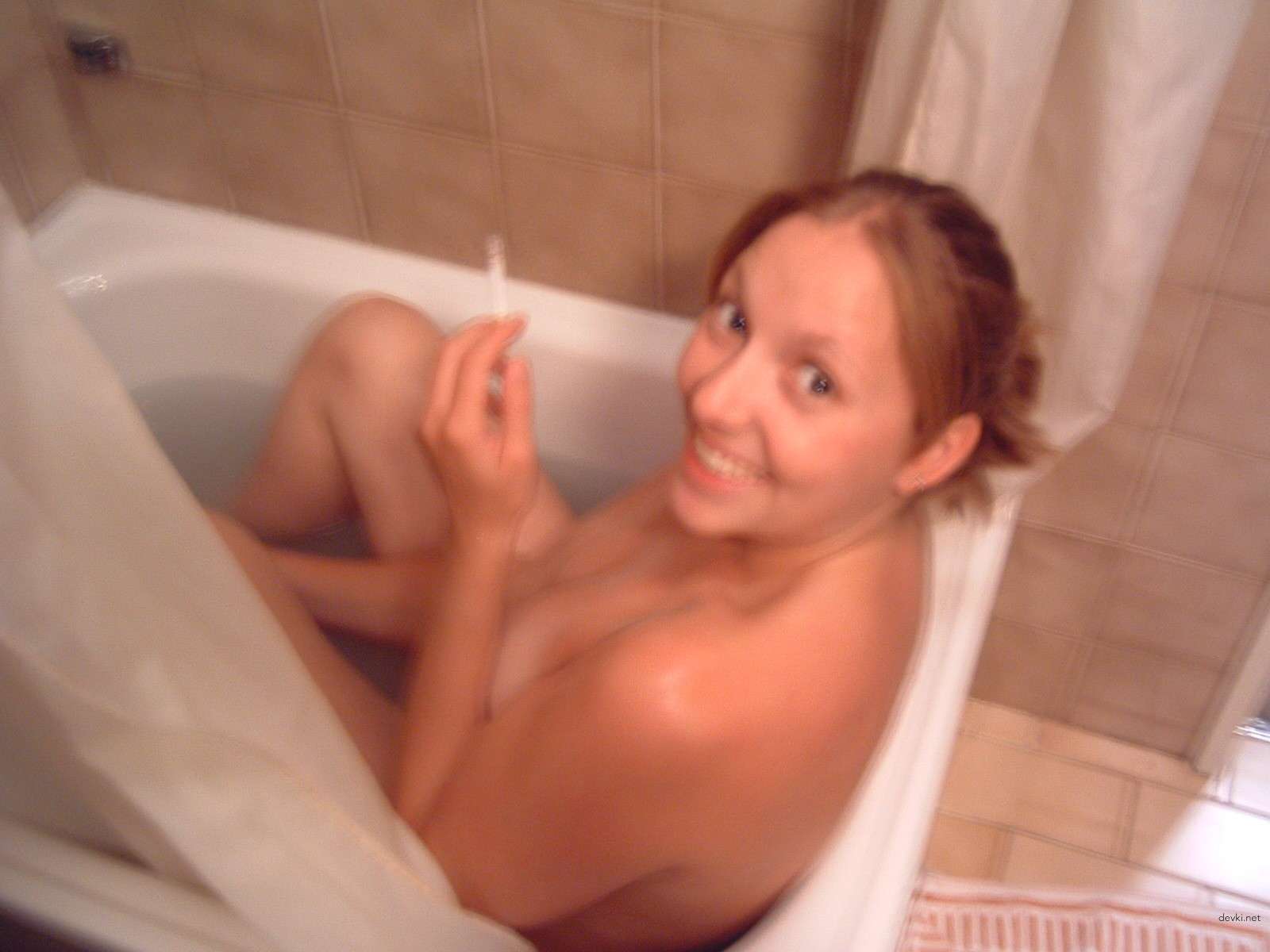 Drunk Woman Engages in Explicit Sex - Amateur Porn Photo