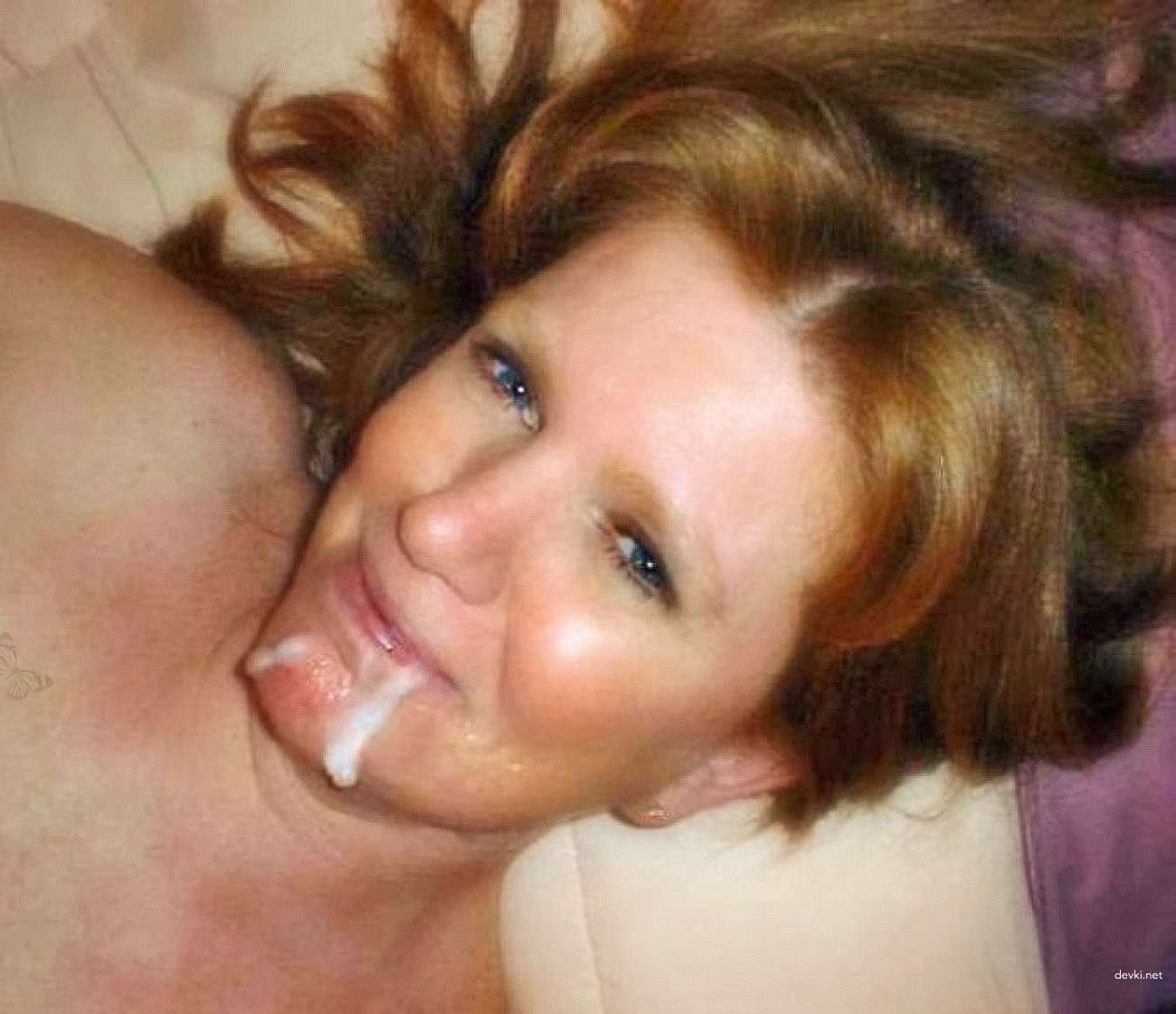 Redhead Woman Covered in Cum: Explicit Amateur Porn Photo